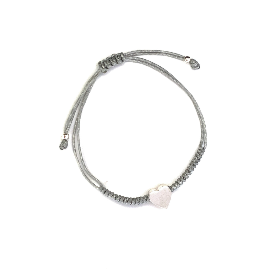 Pulsera tejida con charm Corazón de plata
