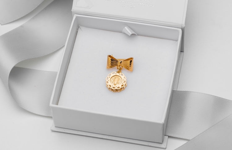 Segurito de San Benito con moñito