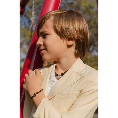 Cruz lisa de plata en cordiño