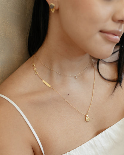 Cadena Cruz con Diamates 14 k