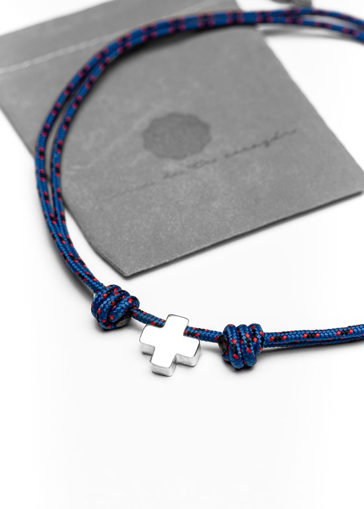 Smooth silver cross in cord